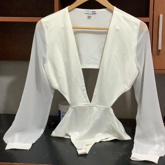 Fashion Nova Tops - Fashion Nova White Peplum Cut Out Bodysuit